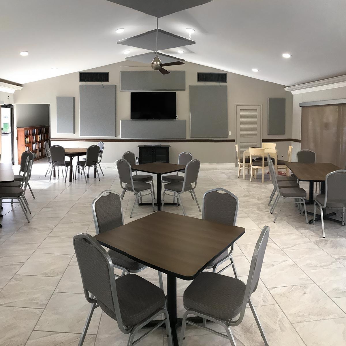 In the Meadowbrook Lakes clubhouse, fabric wrapped panels on the wall and ceiling treat the acoustics in the space.