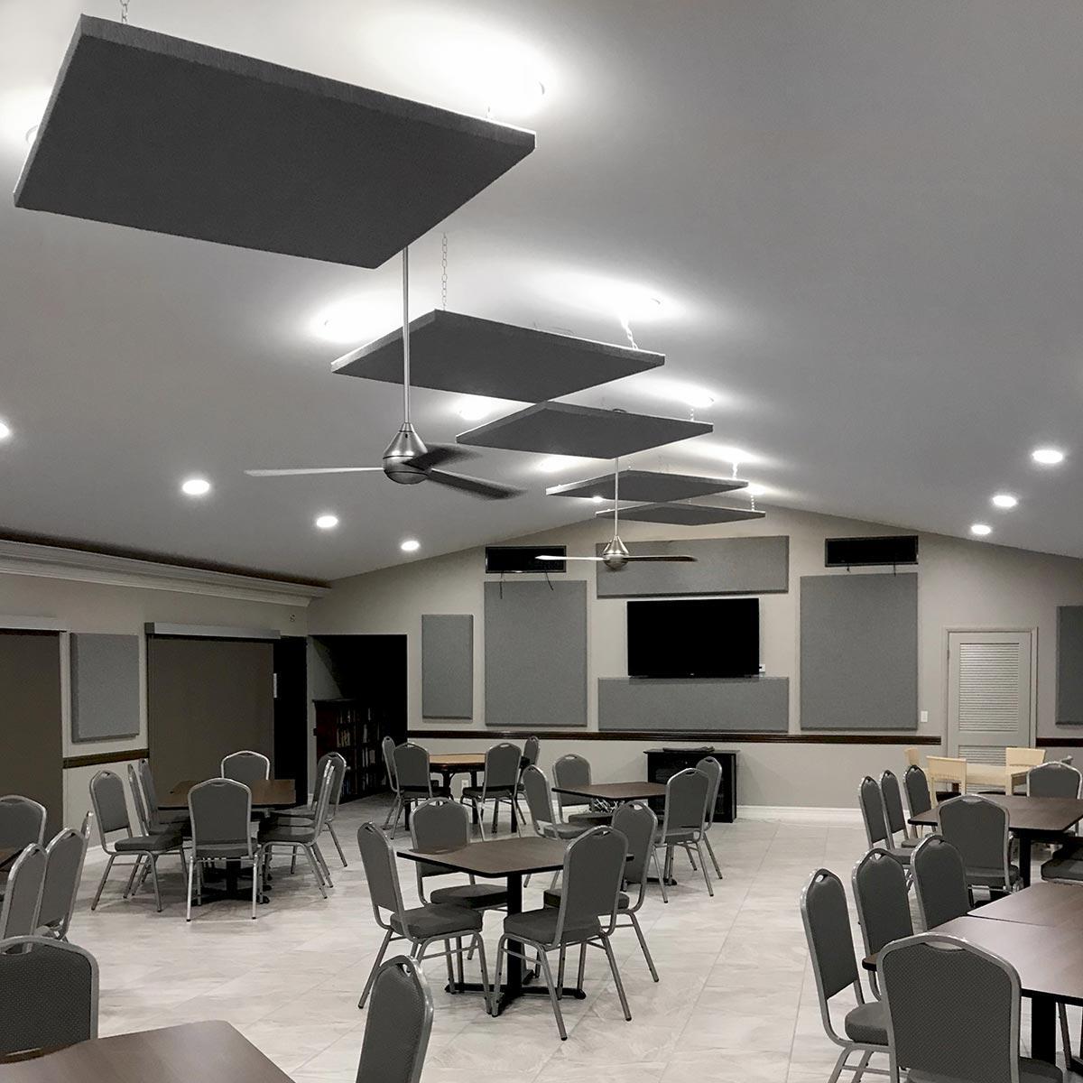 Fabric wrapped acoustic panels on the wall and ceiling of the Meadowbrook Lakes clubhouse.