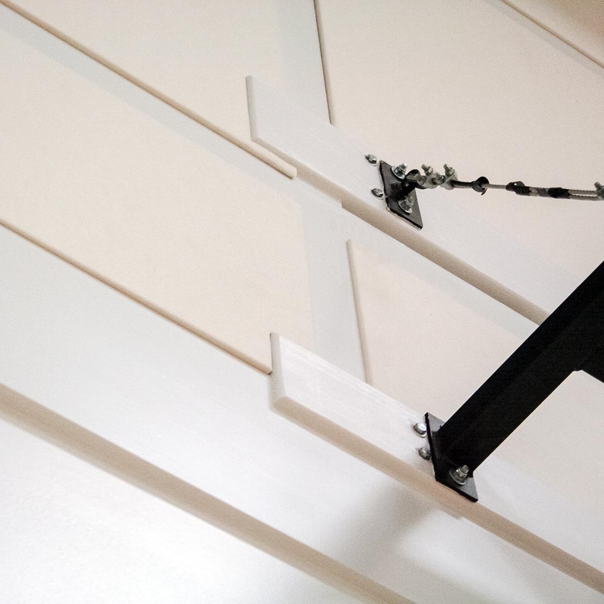 NFL Retiree’s Basketball Court - AlphaSorb® wall panels fitting around gym equipment.