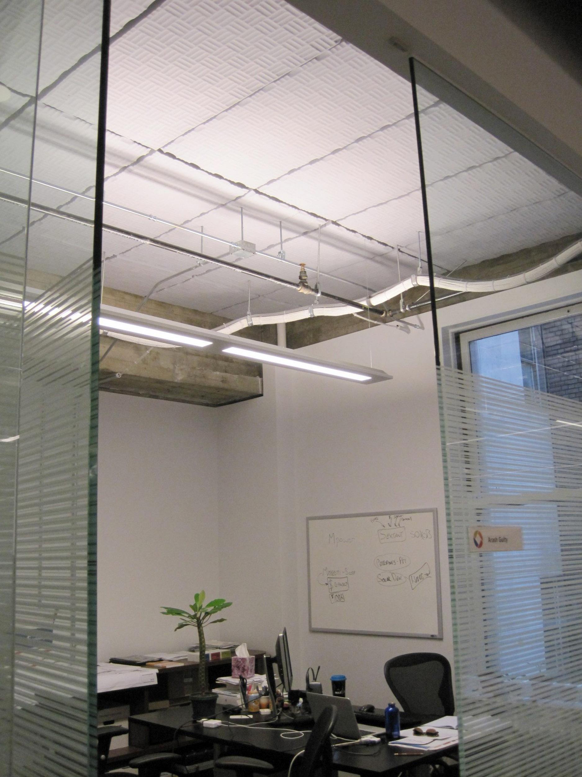 Sonex® Valueline Acoustical foam direct mounted to a concrete ceiling to improve this office's acoustical environment.
