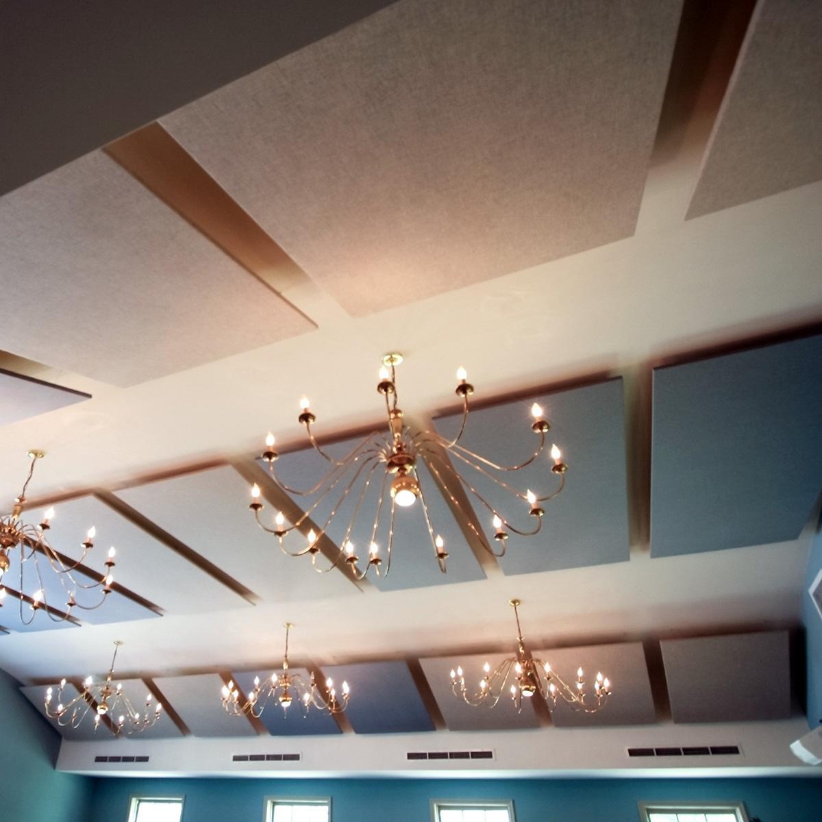 AlphaSorb® Clouds to reduce reverberation and sound focusing effect from the barrel-shaped ceiling.