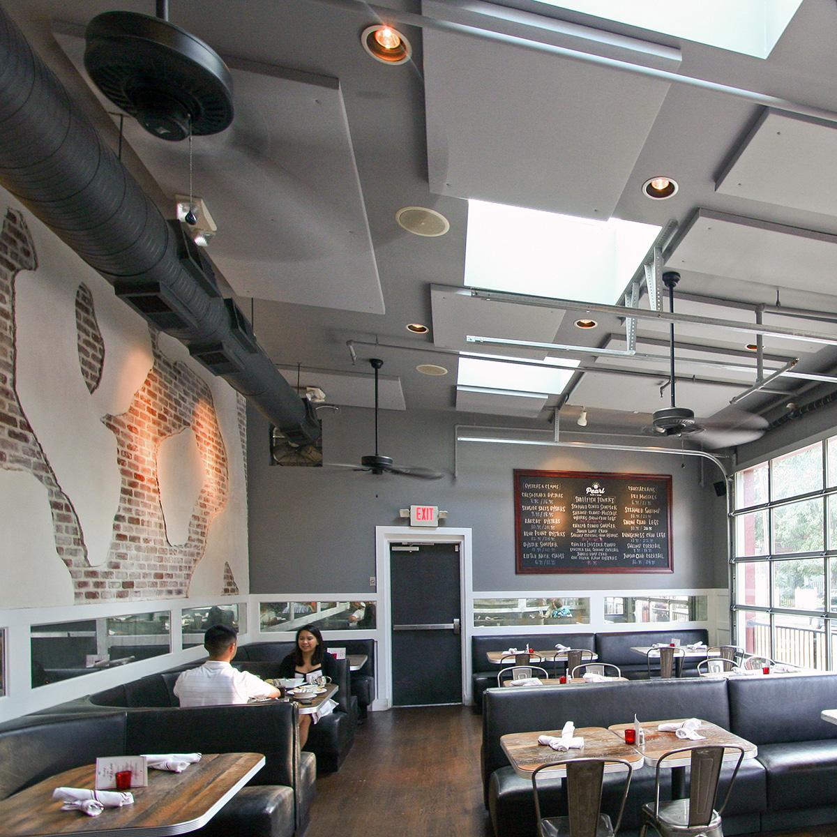 Pearl Raw Bar's ceiling panels provide an acoustically tame atmosphere for an improved dining experience.