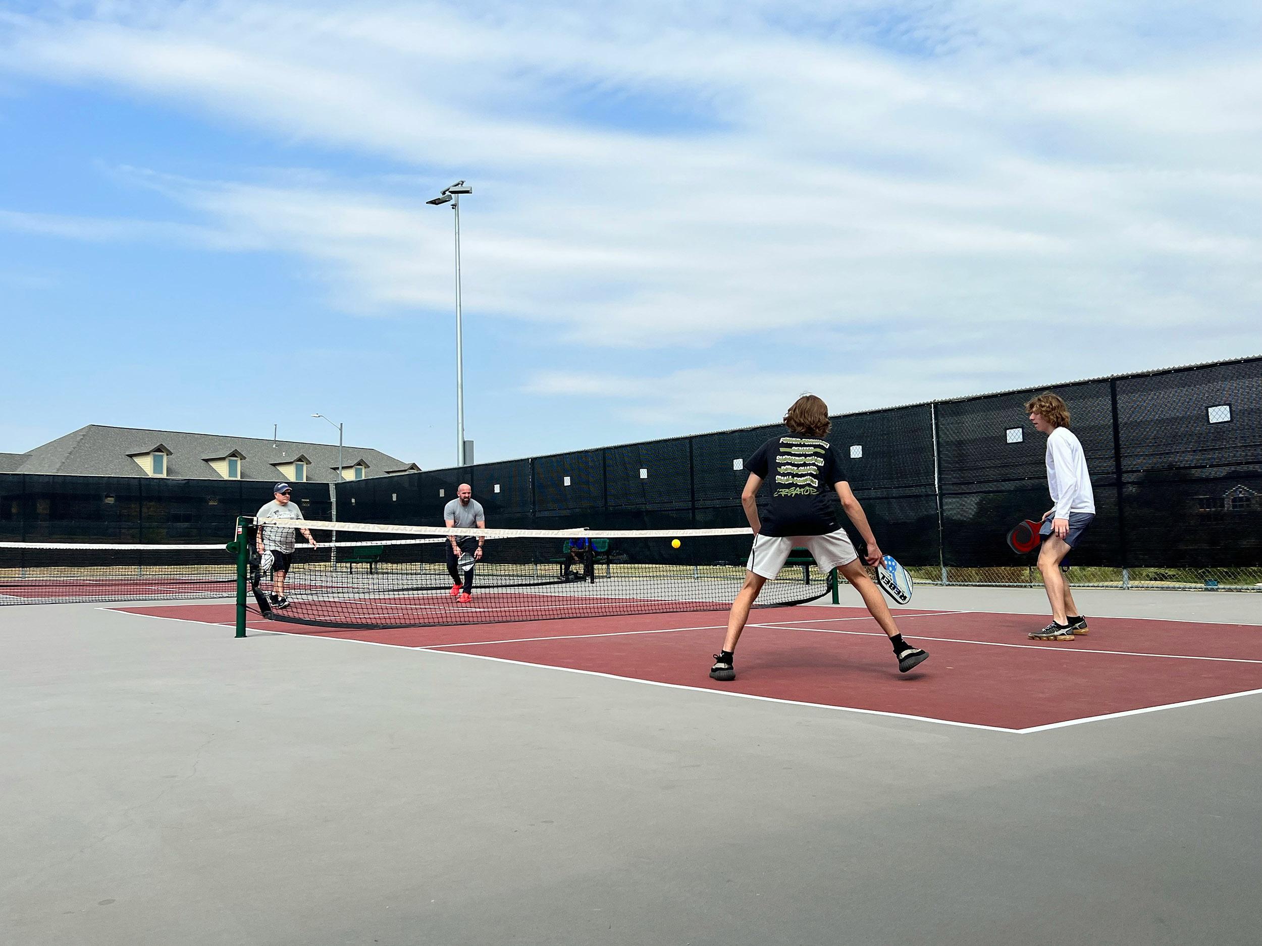 People Playing Pickleball Photo by Lesli Whitecotton on Unsplash