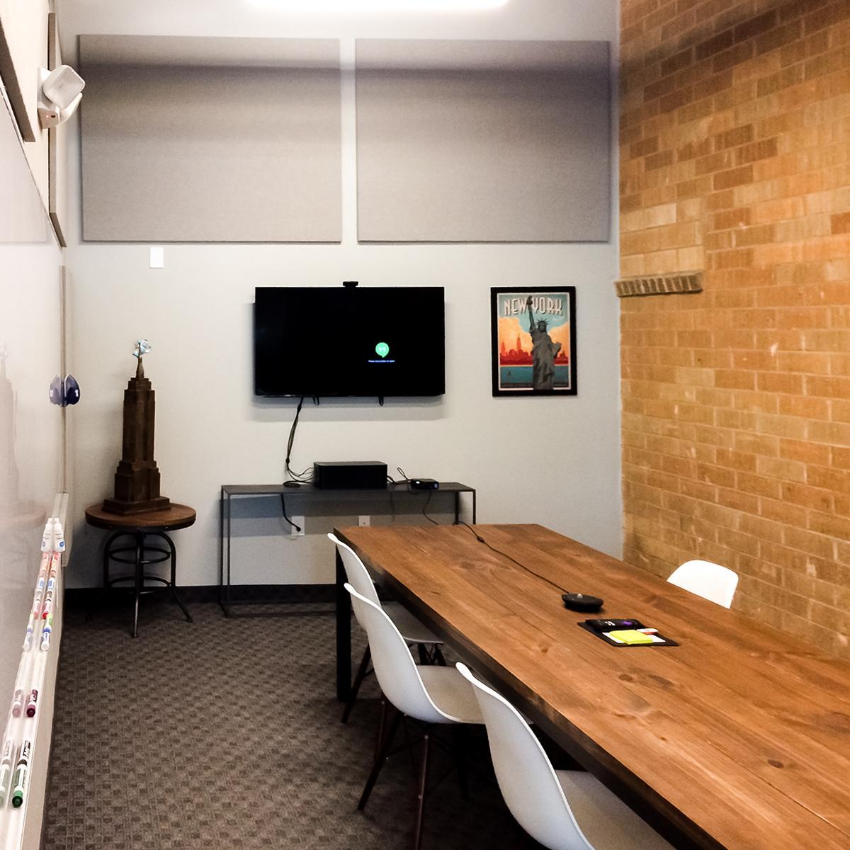 Conference room with acoustical wall panels.