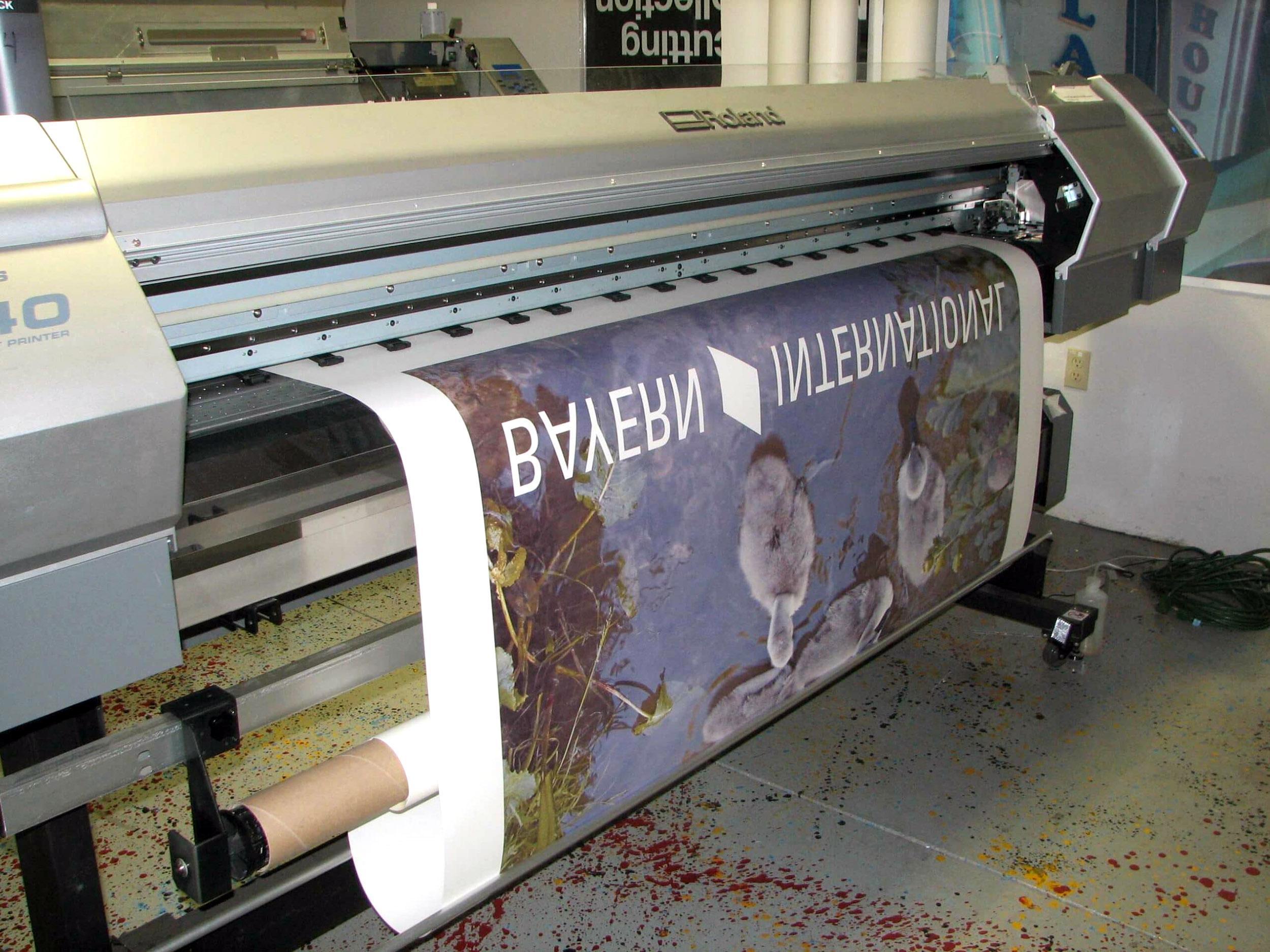 Art is printed onto paper in reverse prior to transfer to fabric