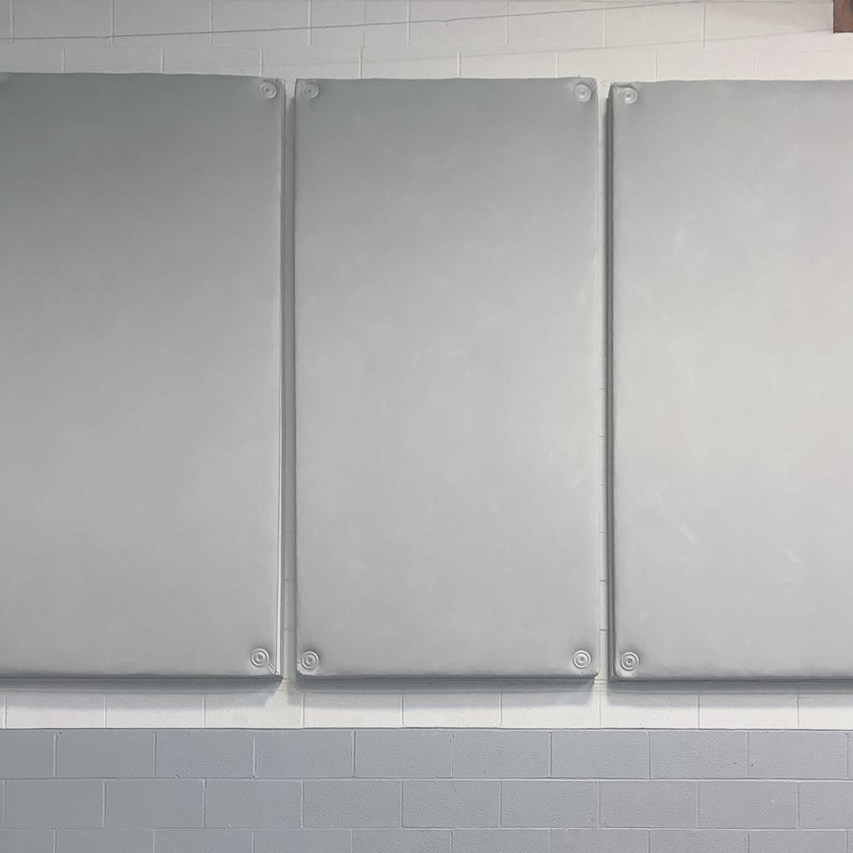 AlphaEnviro® Ripstop Acoustic Panels hanging in a community center reduce reverberation.