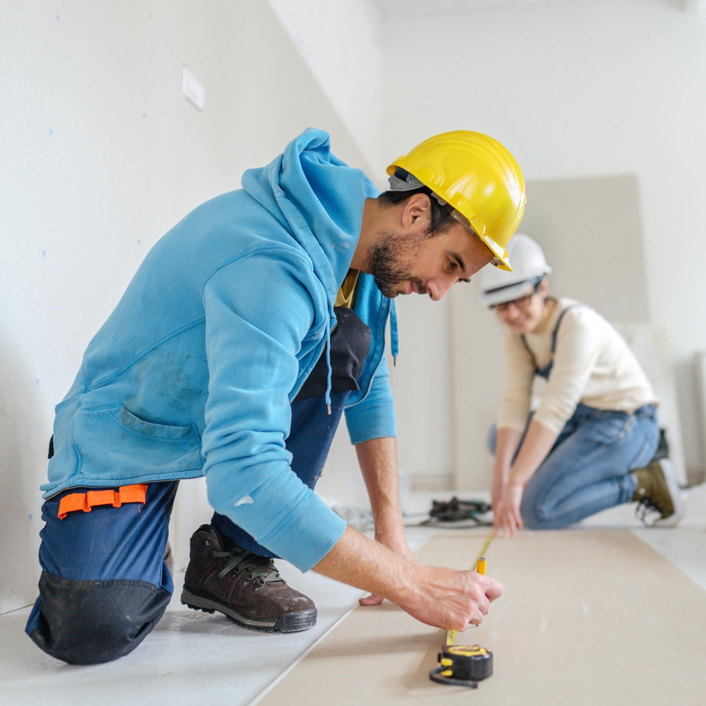 Professional acoustic product installers working on interior project