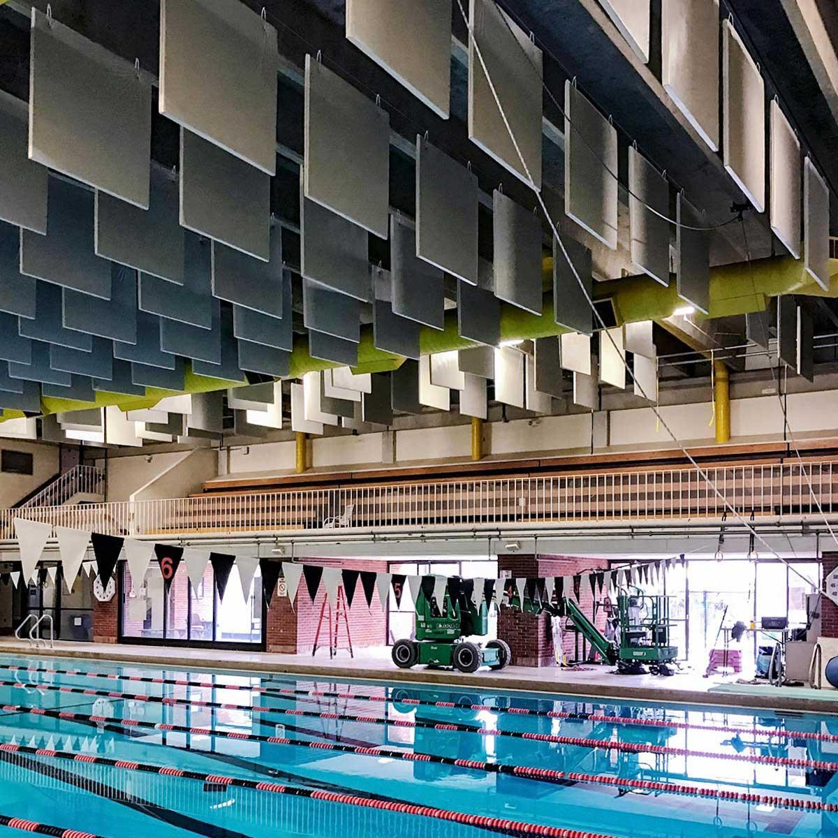A series of 4' x 4' PVC Baffles installed at the Ridgefield Aquatic Club Pool to lower the reverberation and to improve the communication efforts between the coaches and athletes.