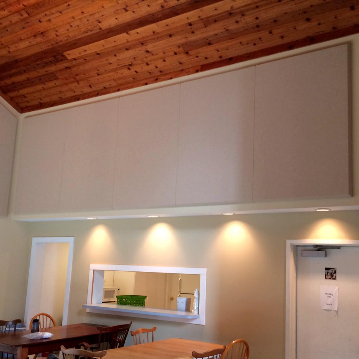 Sound panels installed around the perimeter to reduce flutter echo.