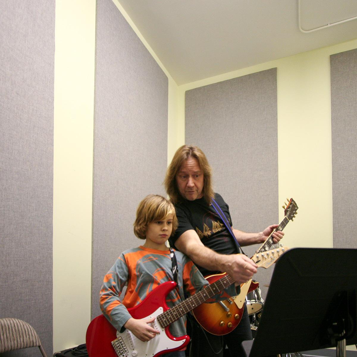 School of Rock - Smaller music practice rooms require good acoustics. AlphaSorb® wall panels reduce room reverberation.
