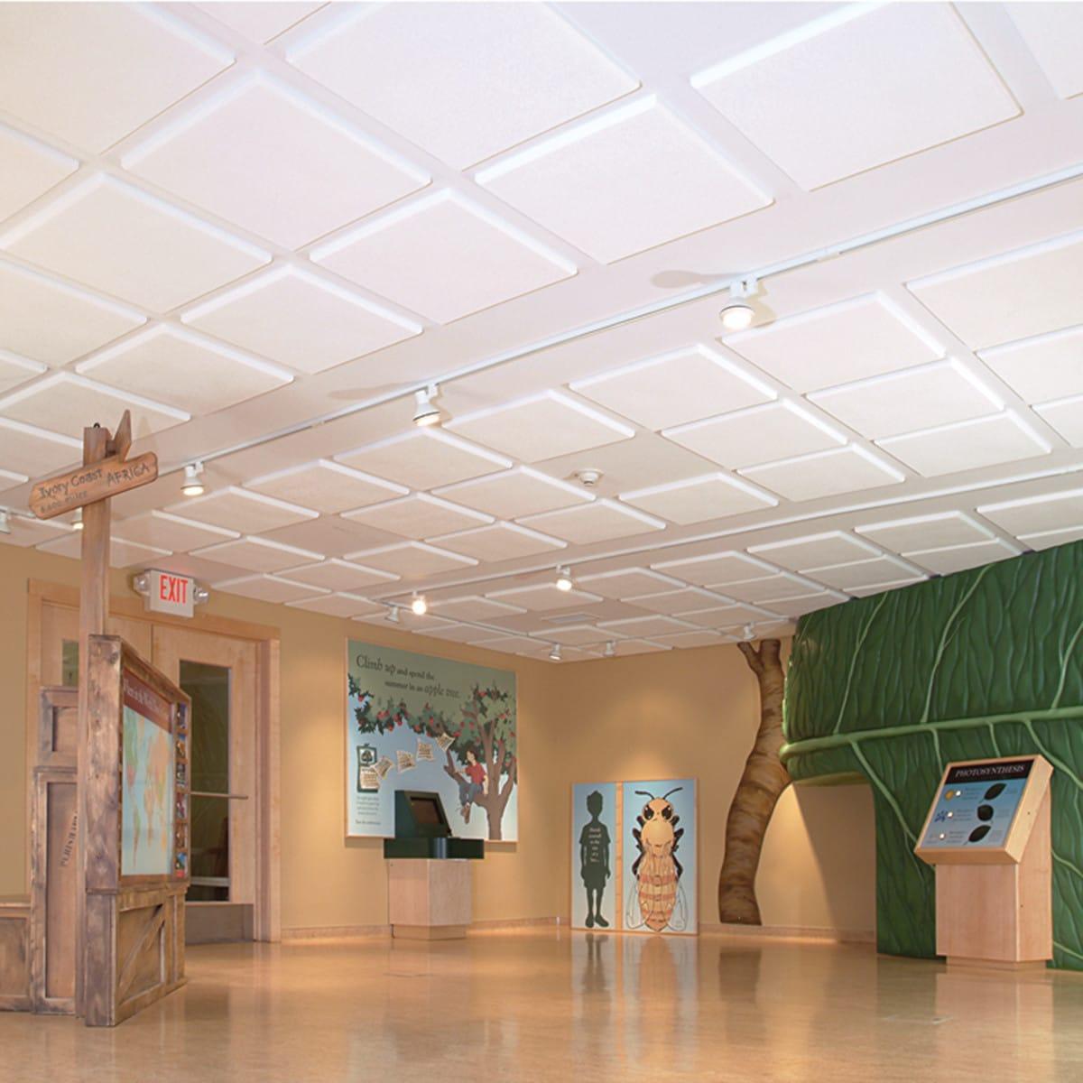 Sonex® Contour Acoustic Panels by Pinta Acoustic, Inc. direct mounted to the ceiling reduce the echo in this exhibit space.