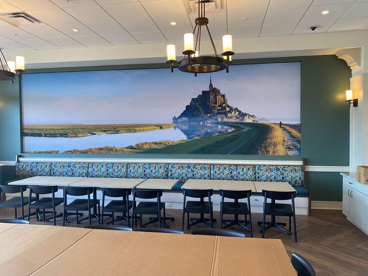A custom printed Acoustiwall installed in the dining hall at Saint Gertrude High School