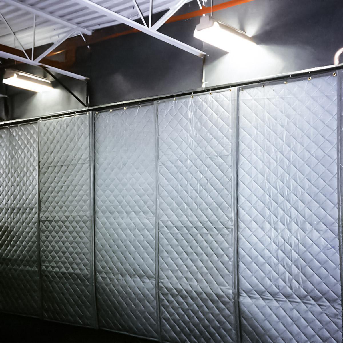 In plant acoustical wall for reducing equipment noise using AudioSeal® Barrier and absorber blankets.