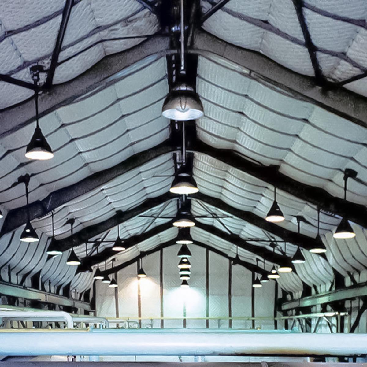Soundproofing blankets line the walls and ceiling of the Tennessee Gas Building to combat the loud noise coming from the building.