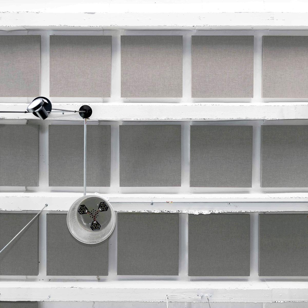 In a brewery, fabric wrapped panels treat the acoustic of the space and reduce echo.