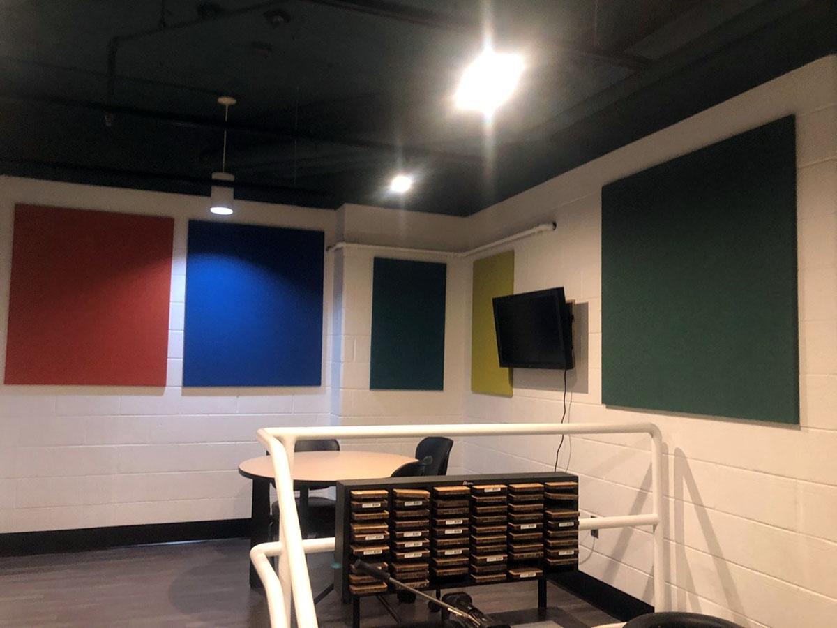 Fabric wrapped panels reduce noise levels in a meeting space at VCU.