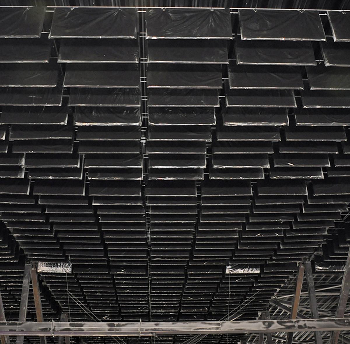 Polywrap 2’x 4’ sound baffles used in plant to reduce noise levels and increase production.