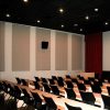 Liberty University Screening Room using two inch thick AlphaSorb® wall panels and speaker fabric to cover the speakers.