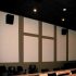 Liberty University Screening Room using two inch thick AlphaSorb® wall panels and speaker fabric to cover the speakers.