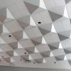 Pyramid Sound Diffusers in a ceiling grid.