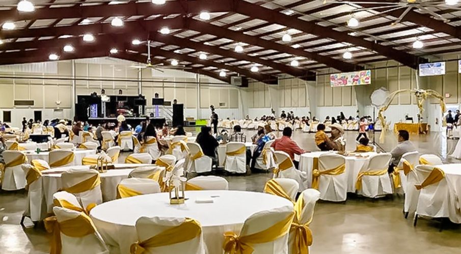 Fannin County Multipurpose Complex using fabric wrapped panels around the perimeter of the room.