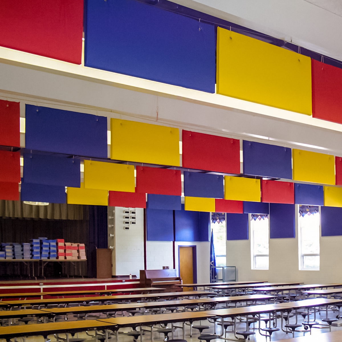 The AlphaEnviro® PVC baffles and panels provide a colorful and effective way to improve the room acoustics in this cafeteria at Mechanicsville Elementary School.
