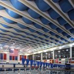 AlphaFlex® PVC Ceiling Banners and AlphaEnviro® PVC Acoustic Panel completely turned this Natatorium (Indoor Pool) into a great sounding and super functional space.