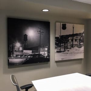 City of Broken Arrow improved their conference room acoustics with fabric wrapped panels and art panels featuring historical photos.